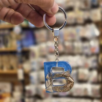 ميدالية ريزن شكل بحر حرف B من بيت المغناطيس